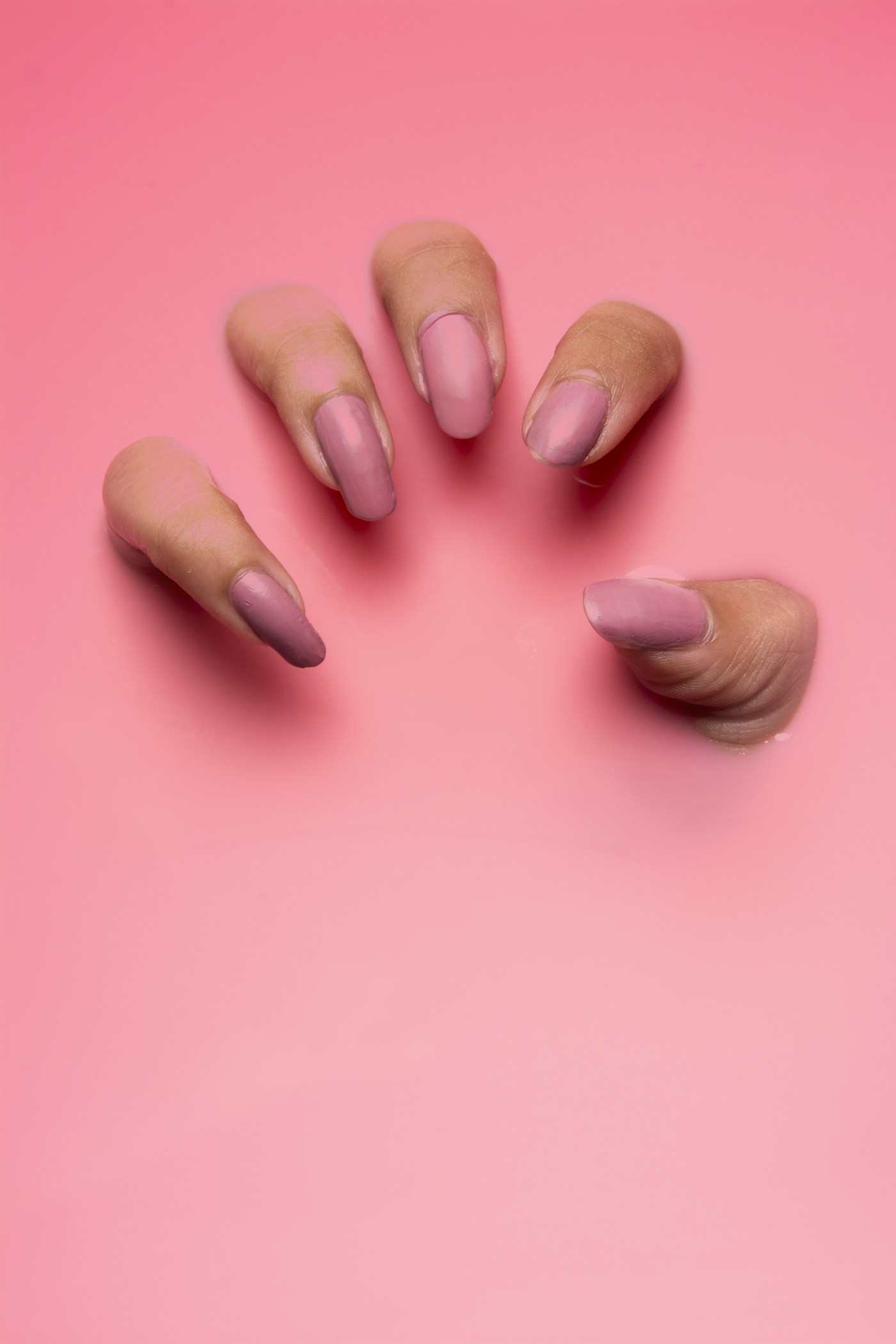 Neutral manicure and ring styling